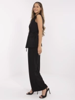 Black women's suit with wide trousers.