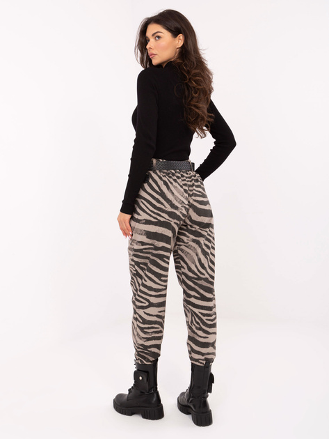 Beżowe damskie spodnie w zebrę