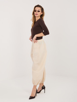 Jasnobeżowe spodnie parachute z kieszeniami RUE PARIS 