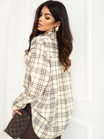 Light yellow women's oversized checkered shirt.