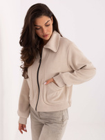 Light beige fleece jacket with a collar.