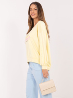 Jasnożółta damska bluza oversize z napisami RUE PARIS 