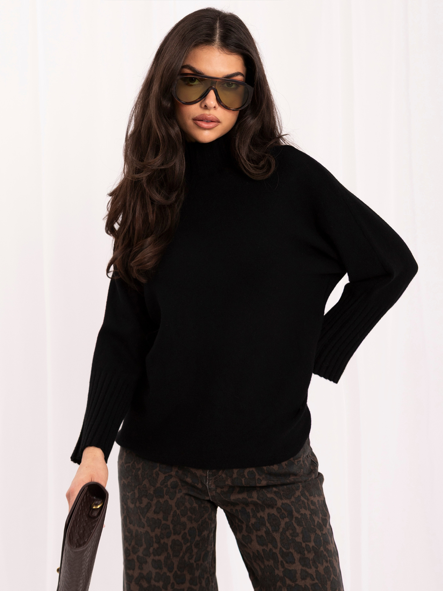 Black women's oversized turtleneck sweater.