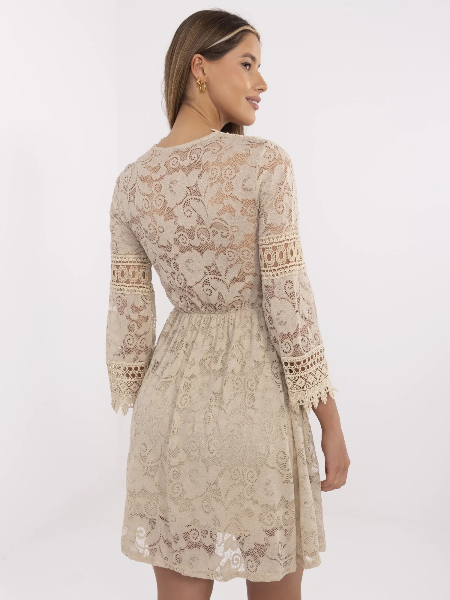 Beige boho dress with a viscose lining.