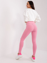 Hurtownia Różowe prążkowane legginsy damskie