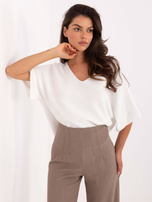 Biały luźny sweter z krótkim swetrem  