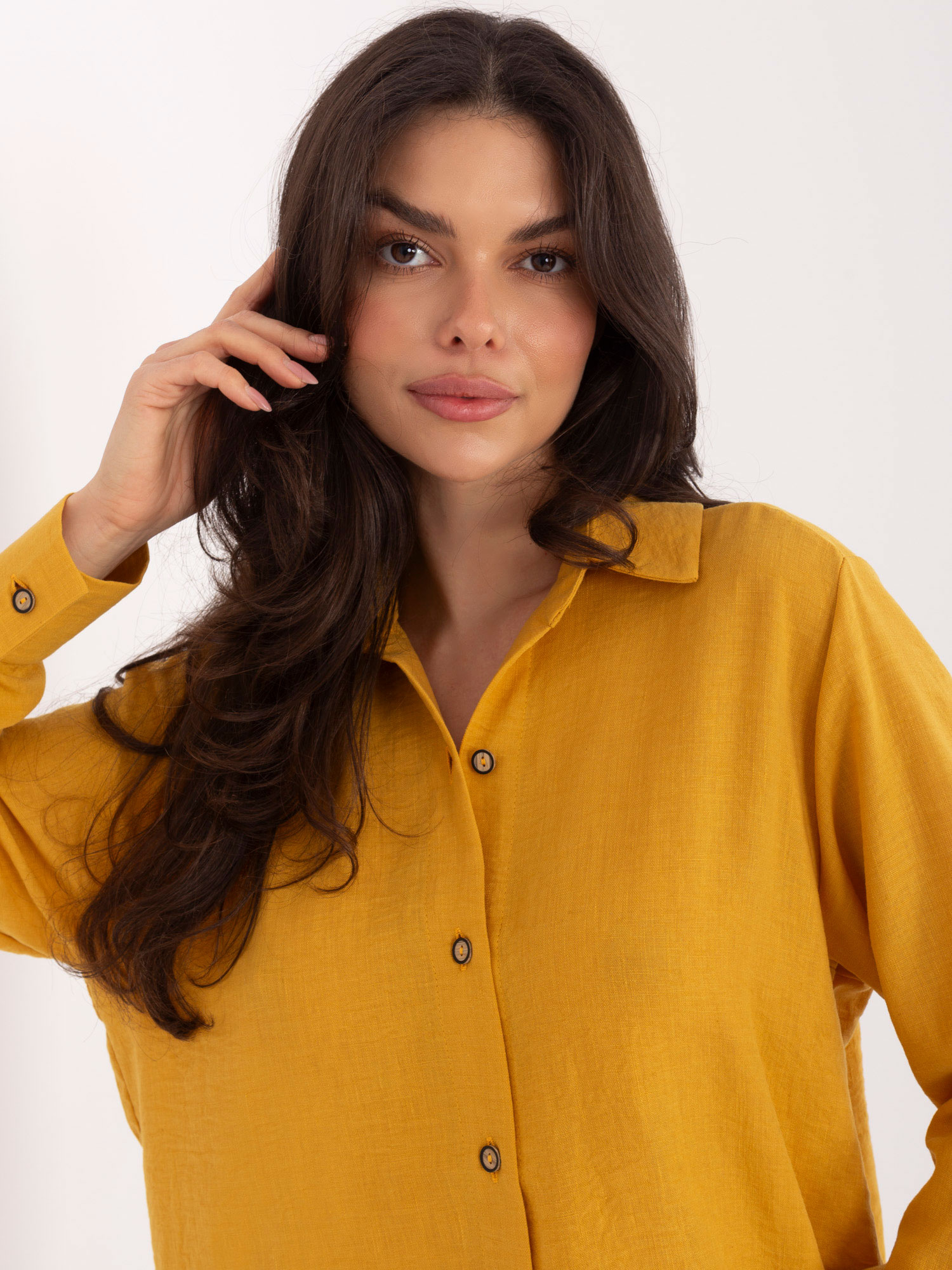 Dark yellow women's long-sleeve shirt.