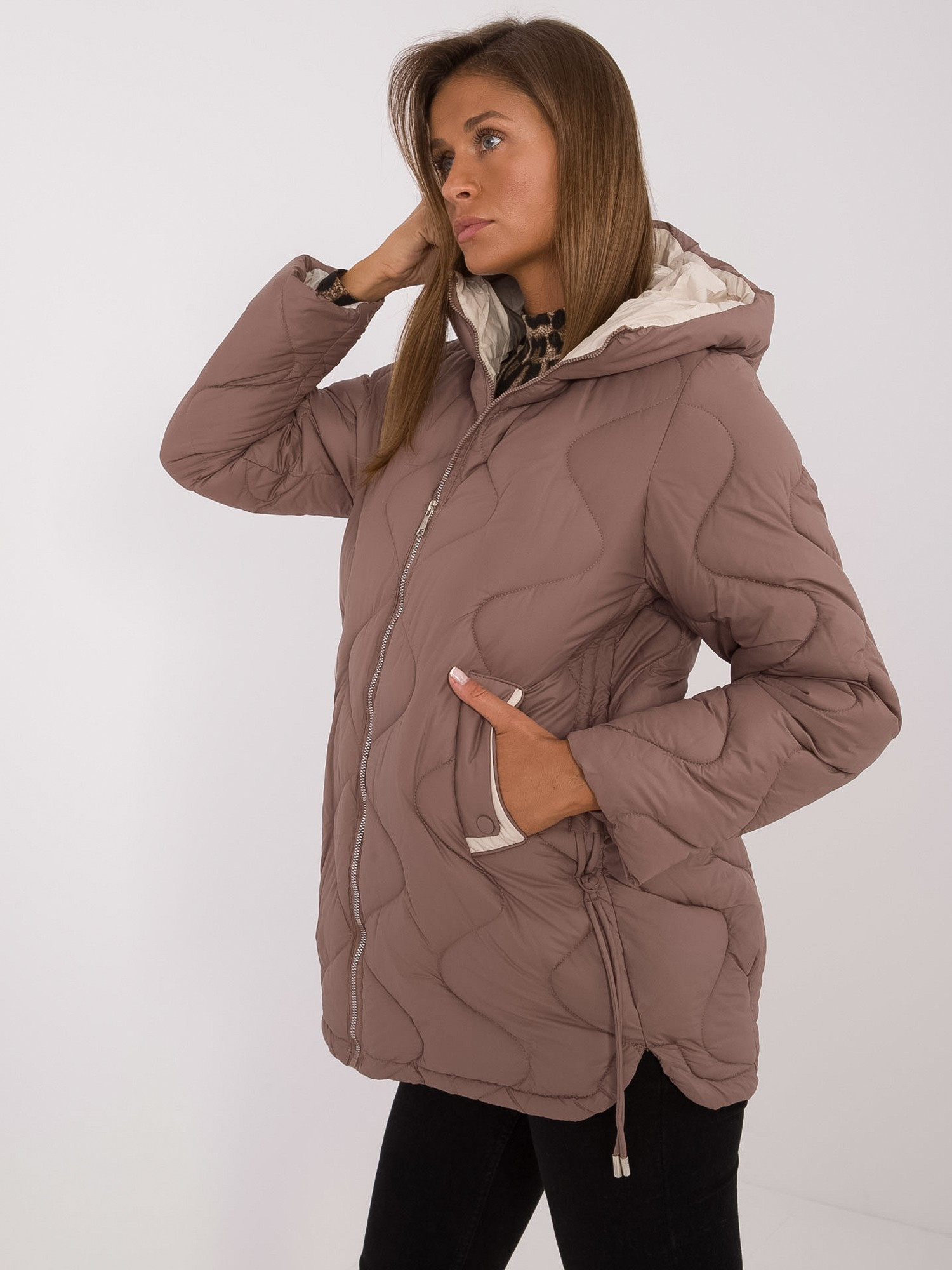 Hurt Brown quilted transitional jacket with a hood.