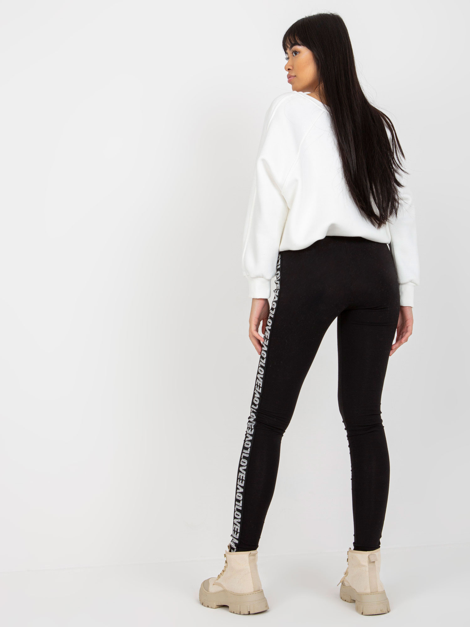 Czarne damskie legginsy casualowe z lampasami