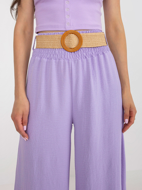 Hurtownia Jasnofioletowe zwiewne spodnie z materiału