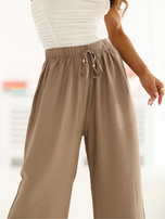 Ciemnobeżowe letnie spodnie z szeroką nogawką