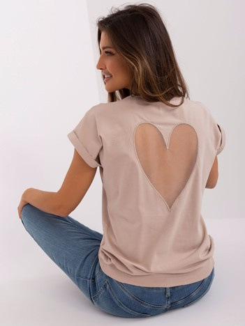Hurt Beige women's blouse with a heart on the back.