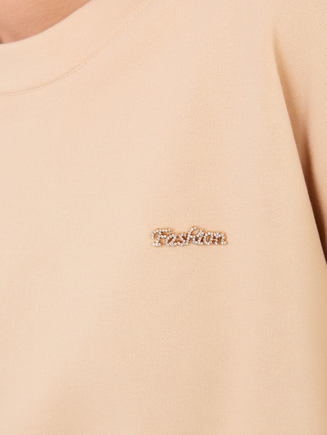 Beżowa bluza oversize z ozdobną naszywką
