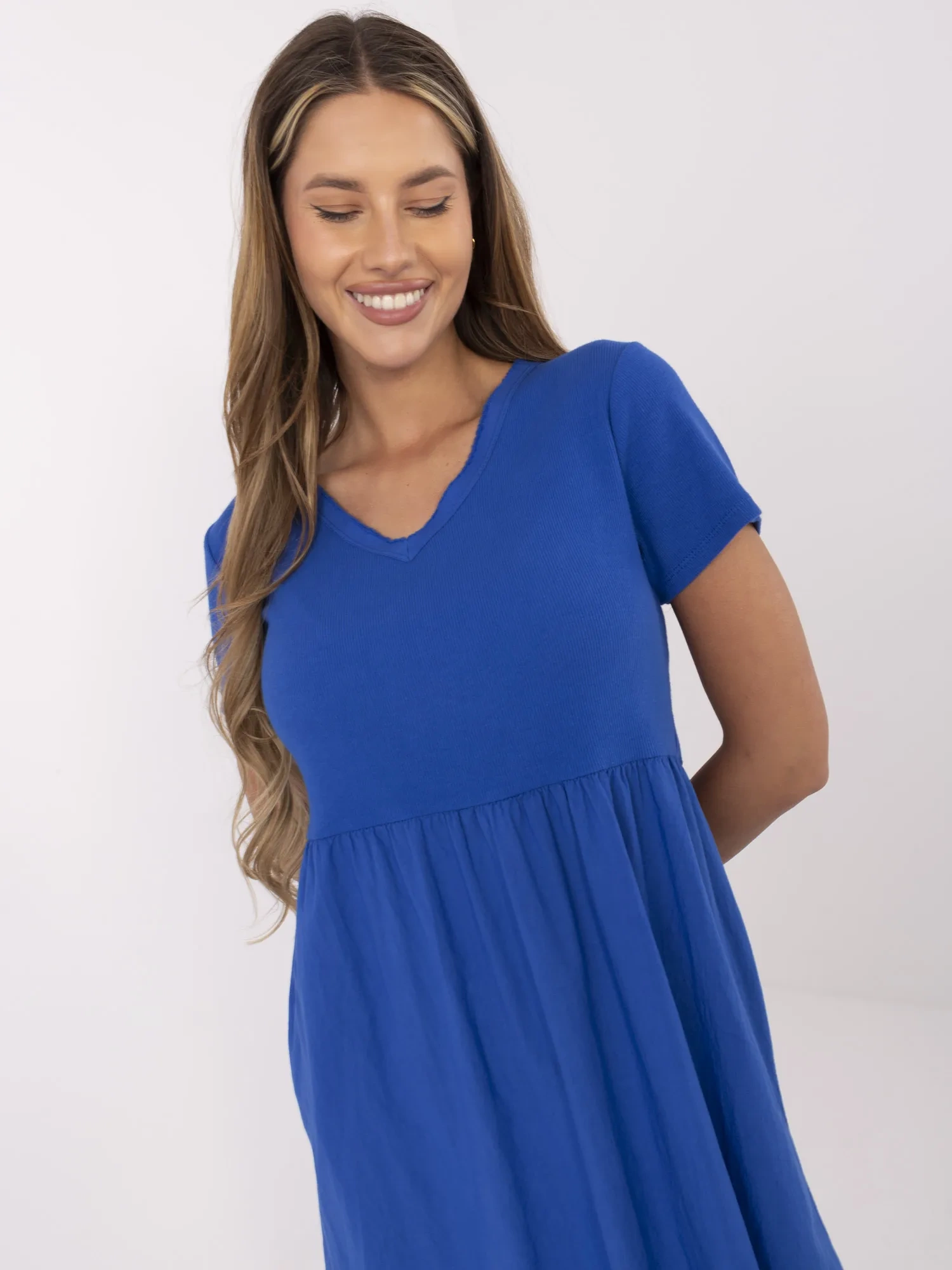 Dark blue dress with short sleeves.