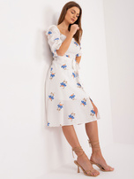 Hurt Ecru-blue floral dress with a slit.