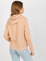 Hurt Brzoskwiniowa bluza rozpinana z kapturem Action NIE ZNASZ MNIE