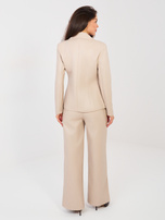 Beżowe szerokie spodnie z ekoskóry