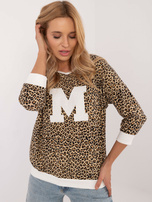 Hurt Ecru-beżowa panterkowa bluzka z naszywką 