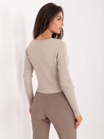 Beżowy sweter z guzikami w kształcie kwiatów