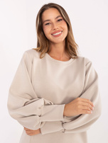 Jasnobeżowa dresowa sukienka o kroju oversize