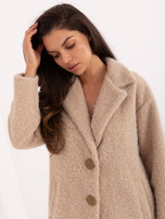Beige single-breasted women's coat.