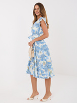 Blue flared dress with patterns.