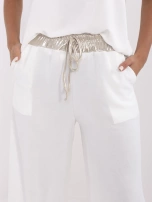 Biały damski komplet ze złotymi wstawkami