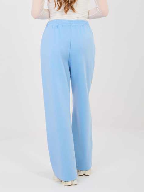 Pastelowe niebieskie spodnie z kontrastowymi lampasami RUE PARIS