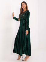 Dark green evening dress with a tie.