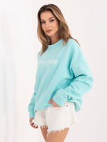 Miętowa ocieplana bluza z napisem RUE PARIS