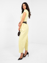 Pastelinė geltona moteriškų morkų kelnės iš štricho.