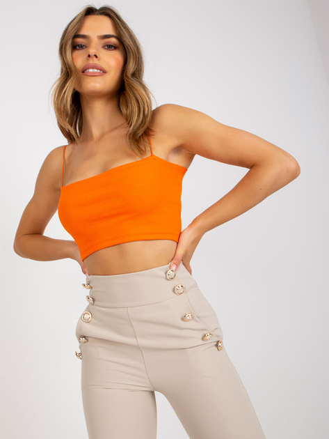 Beżowe eleganckie spodnie z materiału z kieszeniami