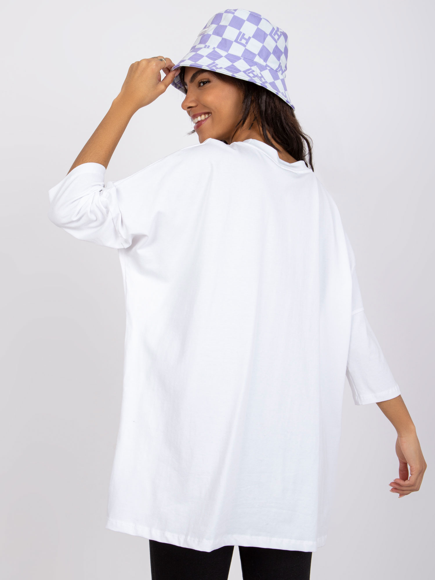 White blouse with the inscriptions Olivia RUE PARIS.