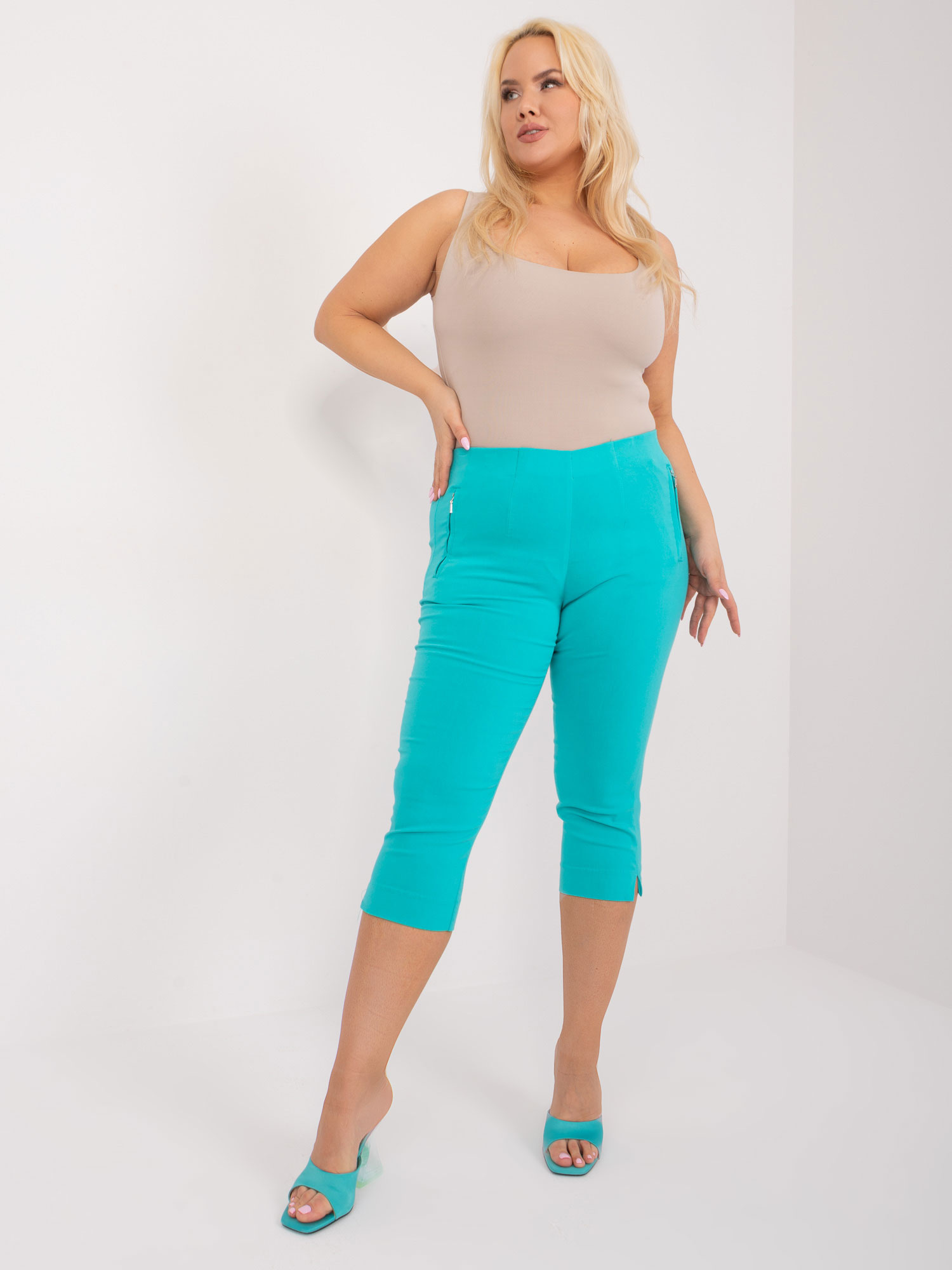 Hurt Turkusowe spodnie 3/4 plus size bez zapięcia