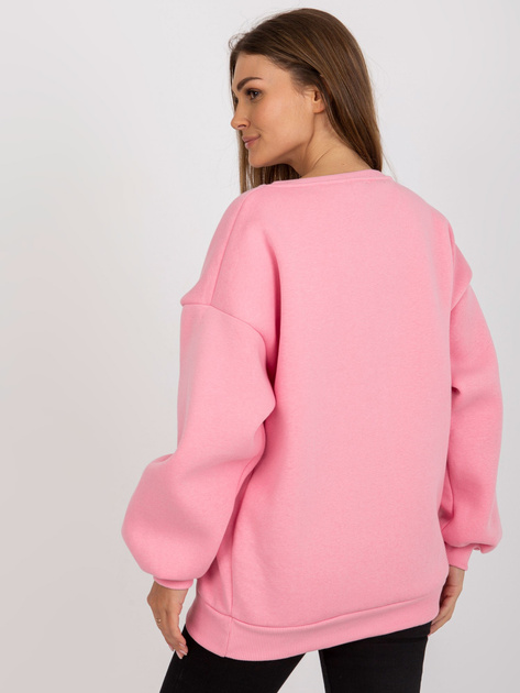 Hurtownia Różowa dresowa bluza bez kaptura z napisem