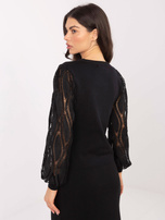 Czarny damski sweter z bufiastymi rękawami