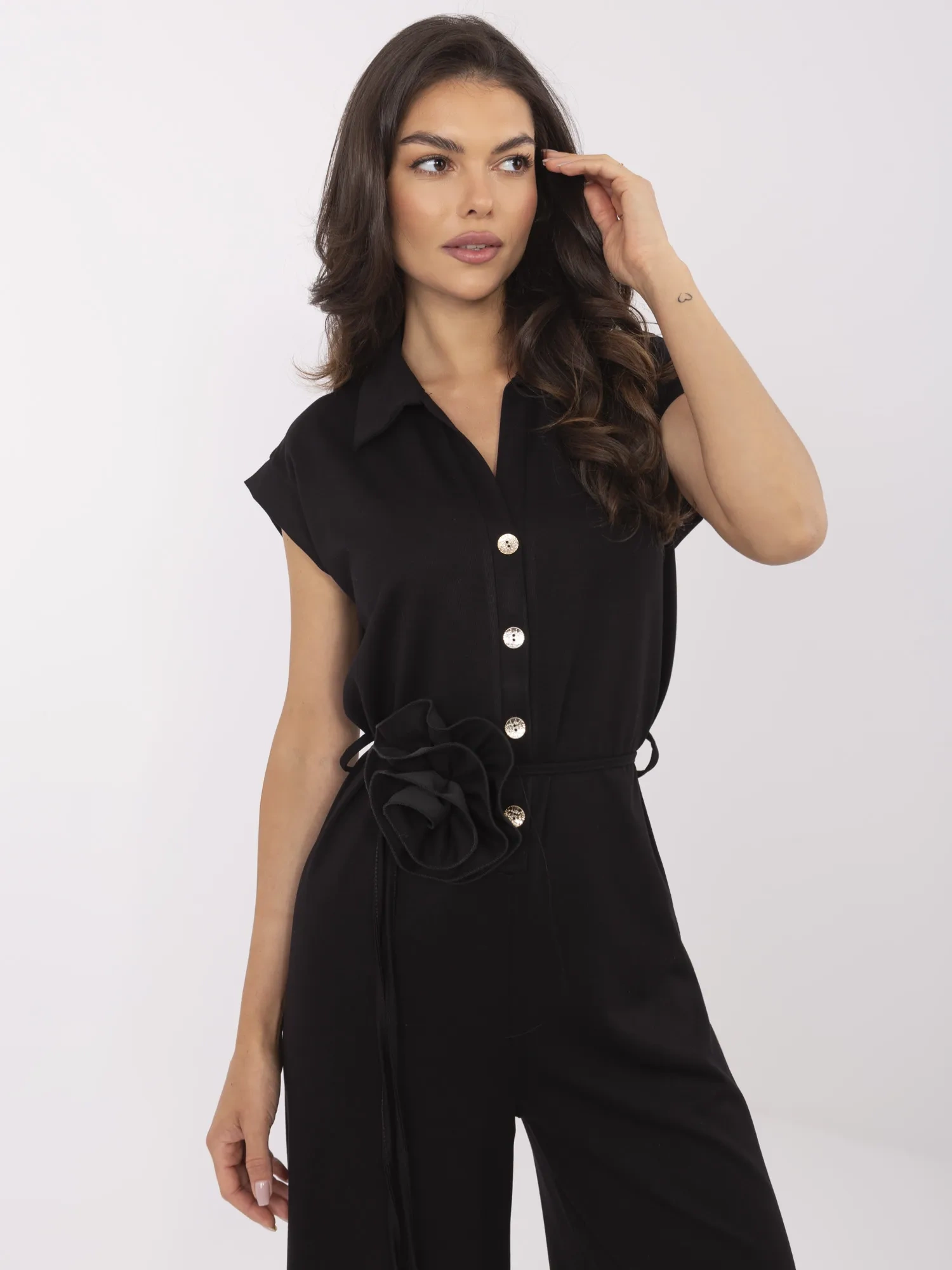 Black elegant jumpsuit with a belt.