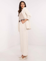 Hurtownia Jasnobeżowe garniturowe spodnie z kieszeniami