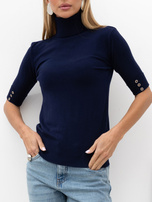 Navy sweater with decorative buttons on the sleeves.