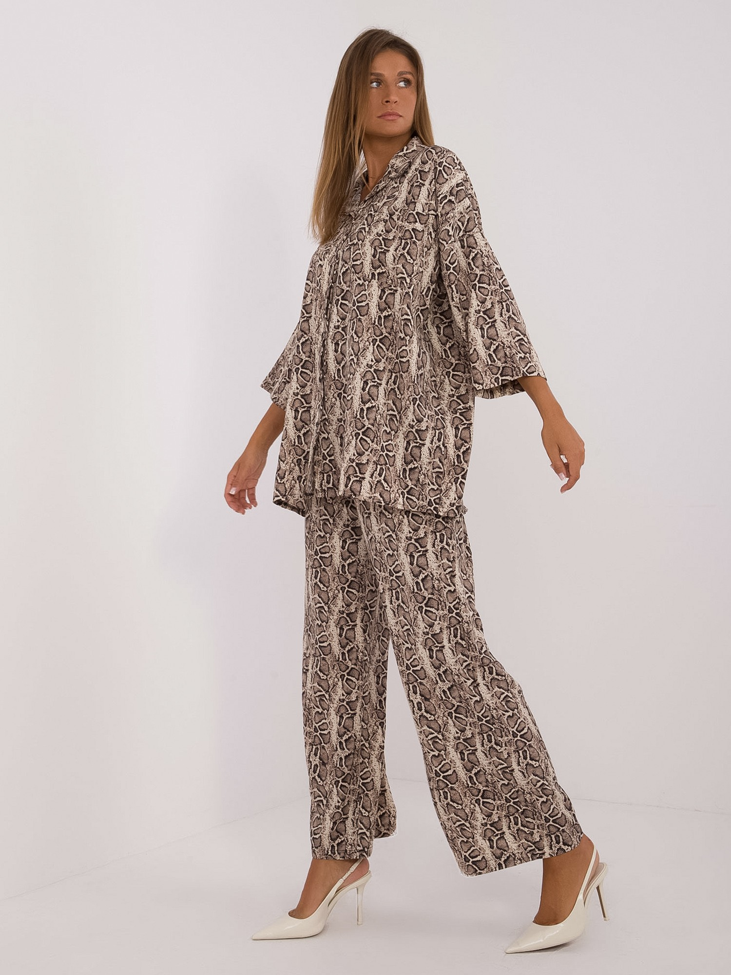 Beige-black two-piece set in animal pattern.