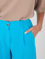 Niebieskie sztruksowe spodnie z nogawką 7/8 RUE PARIS