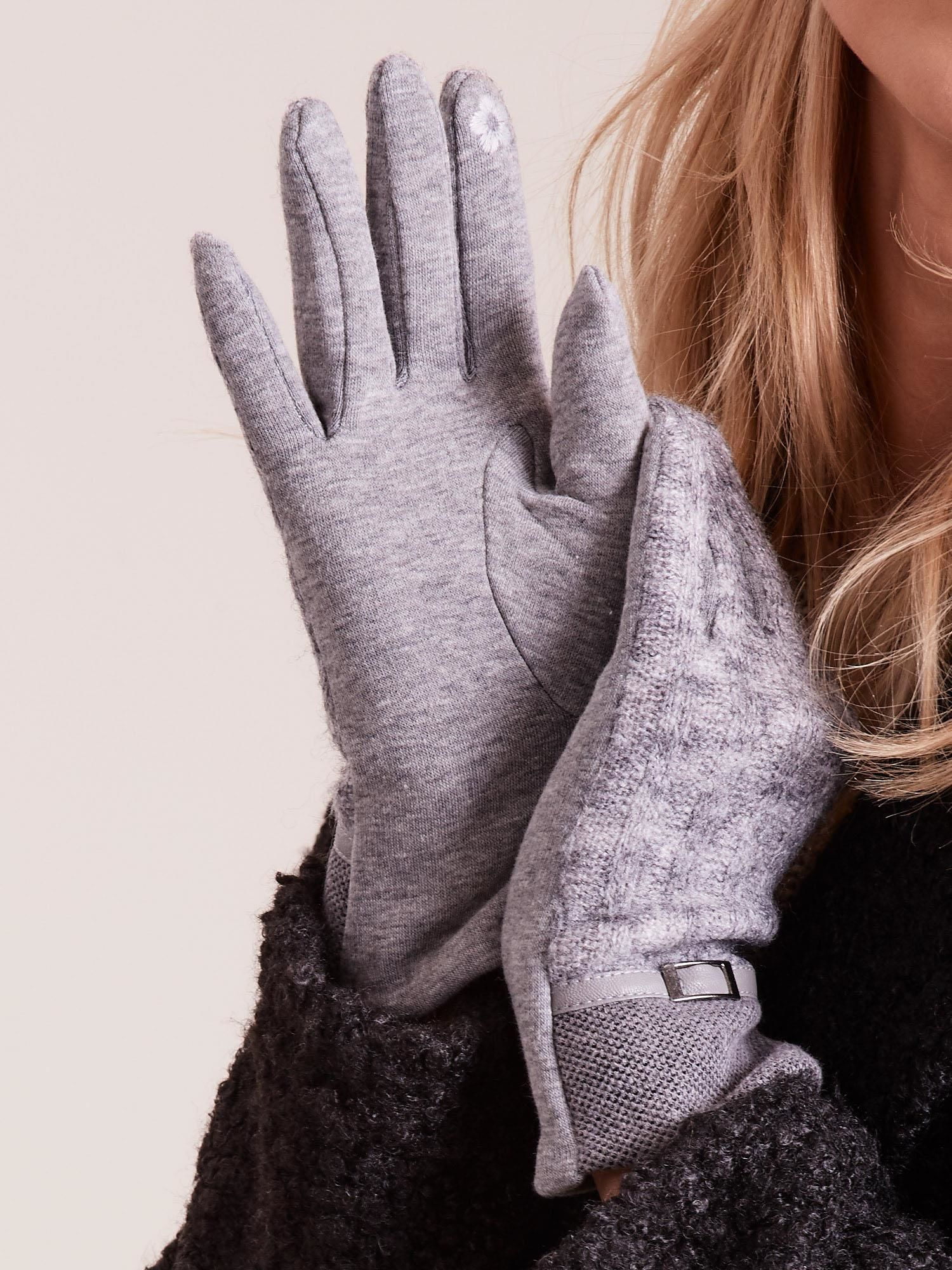 Graue Handschuhe mit Strickeinsatz.