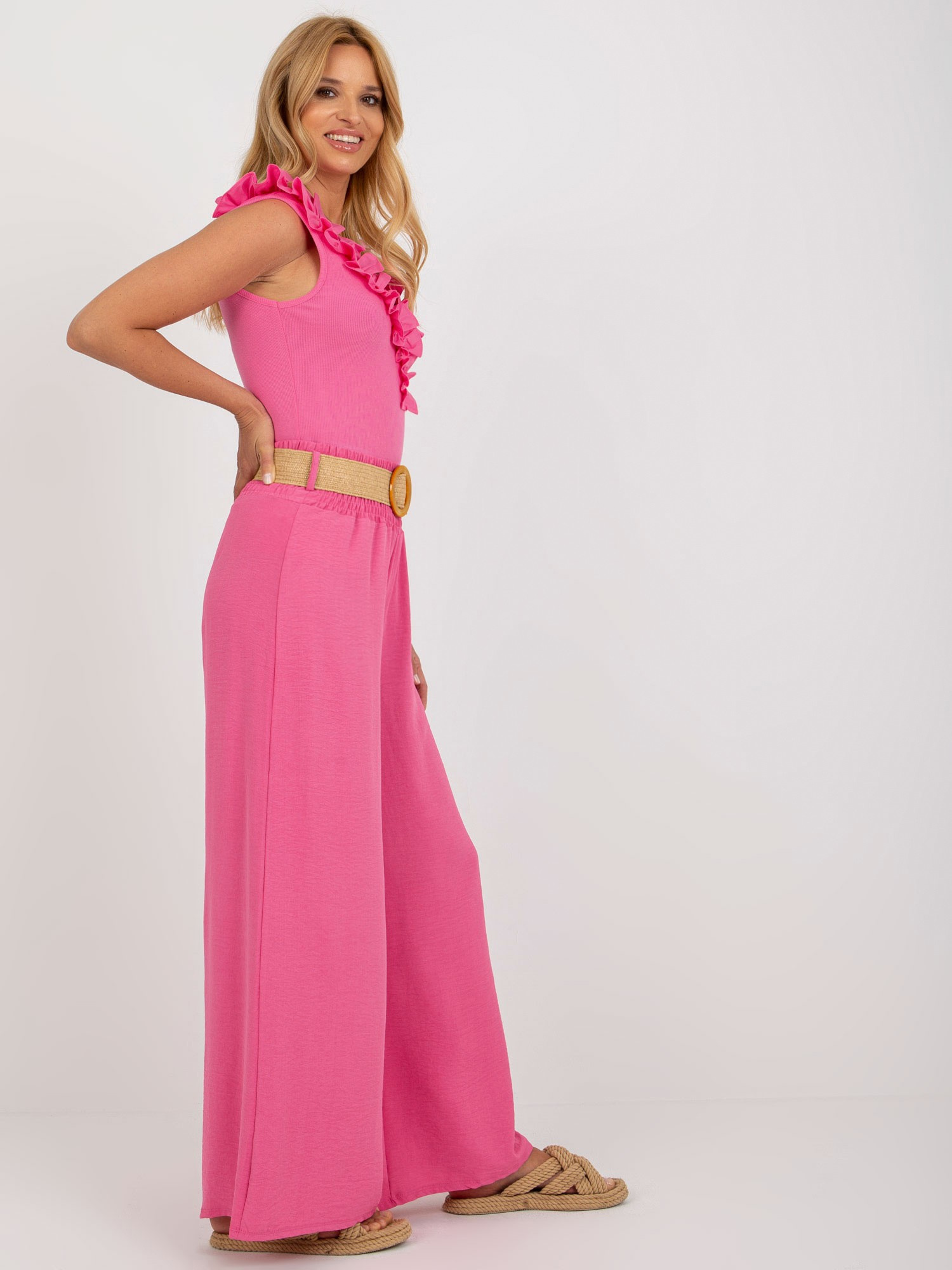 Różowe spodnie z materiału palazzo high waist
