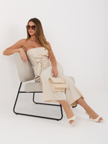 Beżowy elegancki kombinezon z szerokimi nogawkami