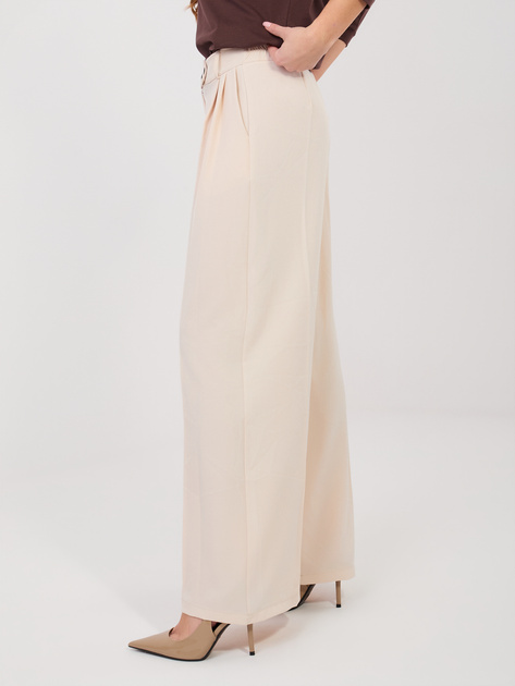 Jasnobeżowe garniturowe spodnie z zakładkami RUE PARIS