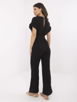 Black muslin jumpsuit with pockets.