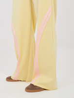 Pastelowe żółte dresowe spodnie z kieszeniami RUE PARIS 