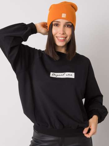 Helle orange Damen Beanie-Mütze.