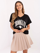 Czarno-beżowy komplet z plisowaną spódnicą