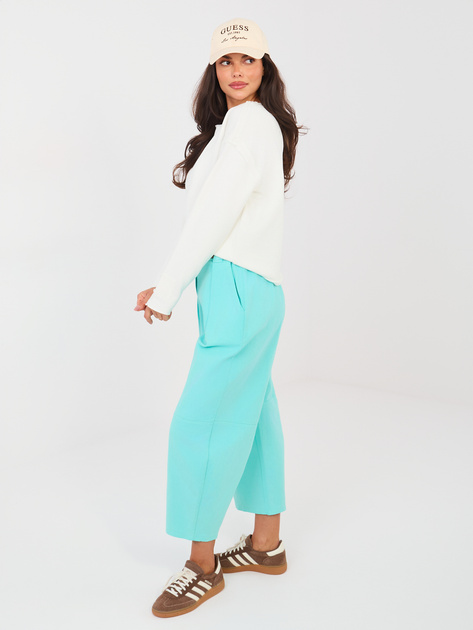 Turkusowe jeansowe spodnie z kieszeniami RUE PARIS